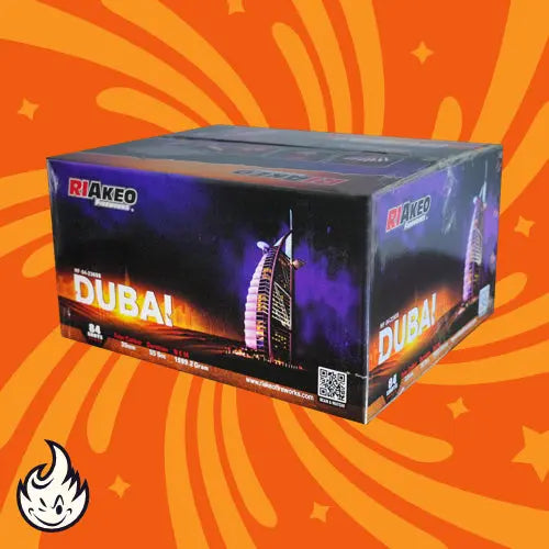 Eine rechteckige Schachtel mit der Aufschrift "Riakeo Dubai Fan" von RIAkeo zeigt das Burj Al Arab Hotel bei Nacht auf einem orangefarbenen, wirbelnden Hintergrund, der an Premium-Feuerwerk erinnert, mit einem dezenten weißen Flammensymbol in der Ecke.